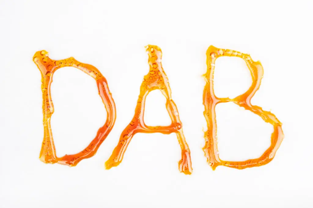 The word dab written with cannabis concentrate